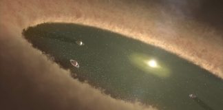 Esta concepción artística muestra planetas gigantes dando vueltas entre los cinturones de polvo. Los científicos creen que el sistema de la estrella HD 95068 puede tener una arquitectura planetaria similar a esta. Mientras que dos cinturones de polvo del sistema de estrellas son conocidos, junto con un planeta masivo, los planetas gigantes pueden estar al acecho y ser aún invisibles.
