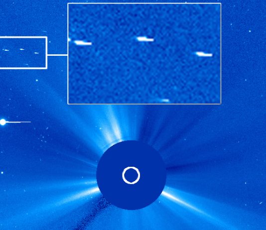 Fotografía del Sol tomada por SOHO muestra tres posibles objetos anómalos.